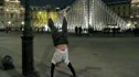 Blair Morrison trains in front of the Louvre