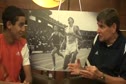 Ammar Moussa talks with Jim Ryun before 2010 Dream Mile