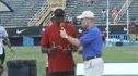 Carl Lewis talks to crowd at NON