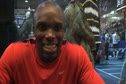 LaShawn Merrit Signing his Shoes for the Perdiction Contest Winner