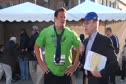 Larry Rawson talks to Dylan Armstrong after winning 2011 Kansas Relays Street Shot
