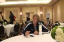 Ryan Hall puts the watch back on before Chicago