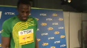 Usain getting photoed and autos
