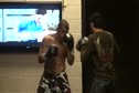 Aaron Simpson hitting mitts
