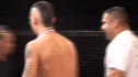 Alex Martinez in the cage post fight