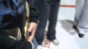 The boys with the belts in back
