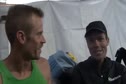 Paul Michel talks with Bobby Curtis after his win at 2011 Boston Marathon BAA 5k