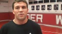 Doug talks about match with Keddy and Admires his picture on the wall