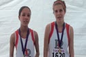 Sophie Epsteine and Celine Abella (Redwood HS), 1st and 2nd place, JV Girls at the 2011 Ed Sias Invitational